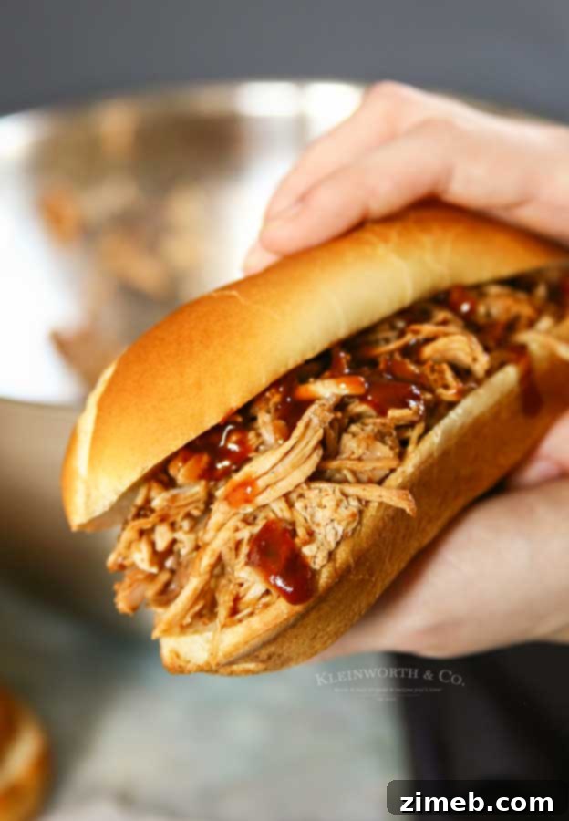 Tender Instant Pot Dr. Pepper Pulled Pork 5 Instant Pot Dr. Pepper Pulled Pork sandwich with coleslaw