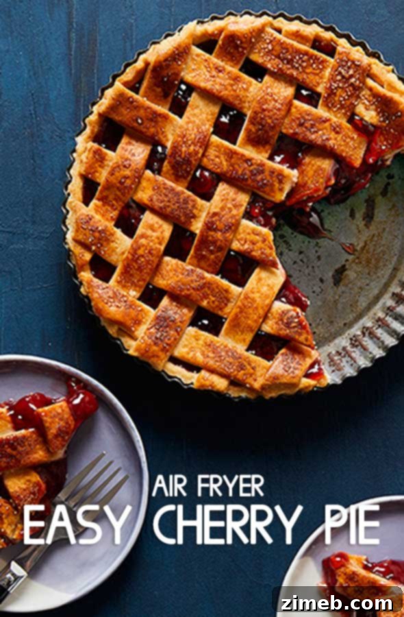 Final shot of a whole Air Fryer Cherry Pie, golden brown and inviting