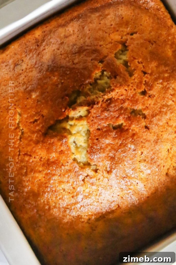 Effortless Air Fryer Banana Bread 4 Cooked banana bread in the air fryer, golden brown and ready to serve.