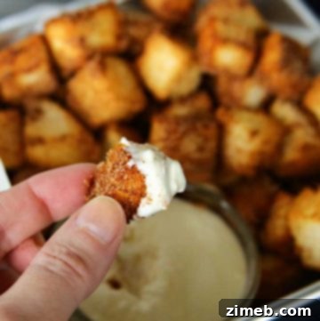 Effortless Air Fryer Banana Bread 8 Air Fryer Angel Food Cake Churro Bites Dessert Recipe, coated in cinnamon sugar.