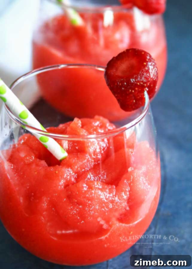 Close-up of a refreshing Strawberry Daiquiri, ready to be enjoyed.