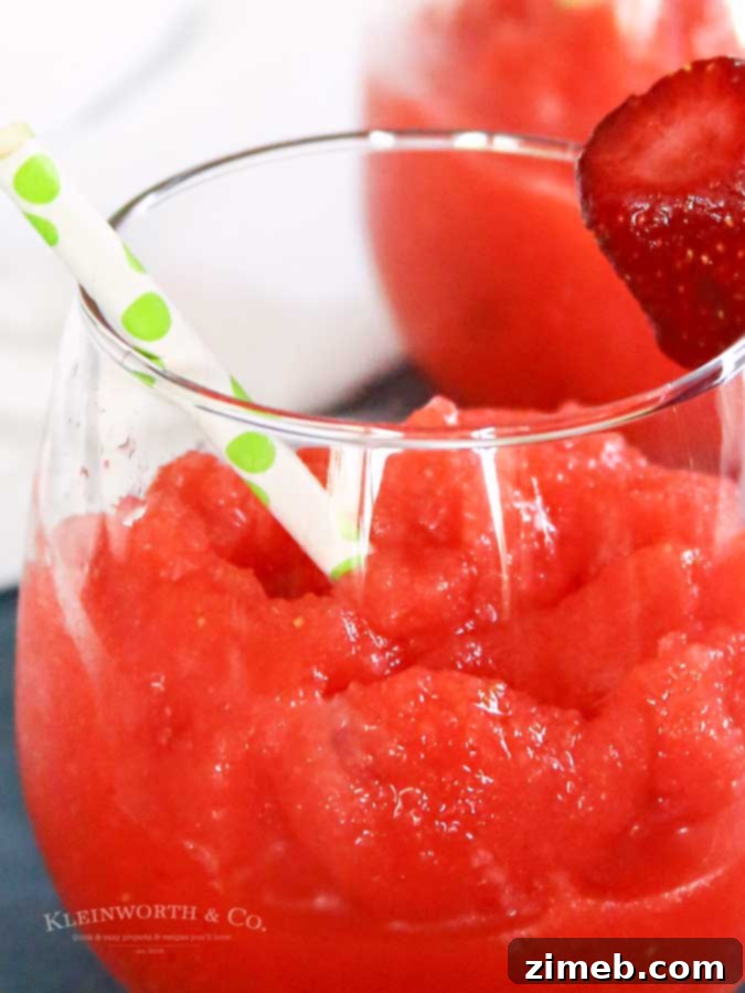 Enjoying a perfect blended Strawberry Daiquiri on a hot day.