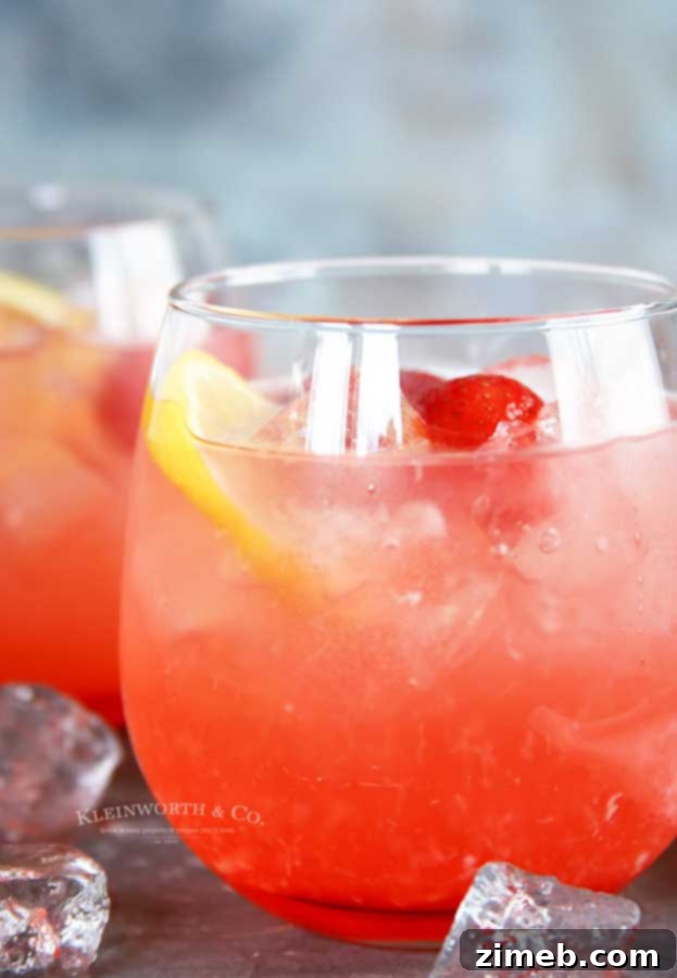 Sun-Kissed Peach Strawberry Lemonade 6 Peach drink recipe for summer parties
