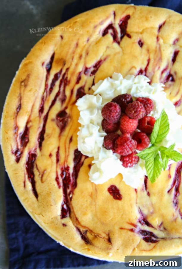 Decadent Raspberry Cheesecake 4 baked raspberry ripple cheesecake - Raspberry Cheesecake Recipe
