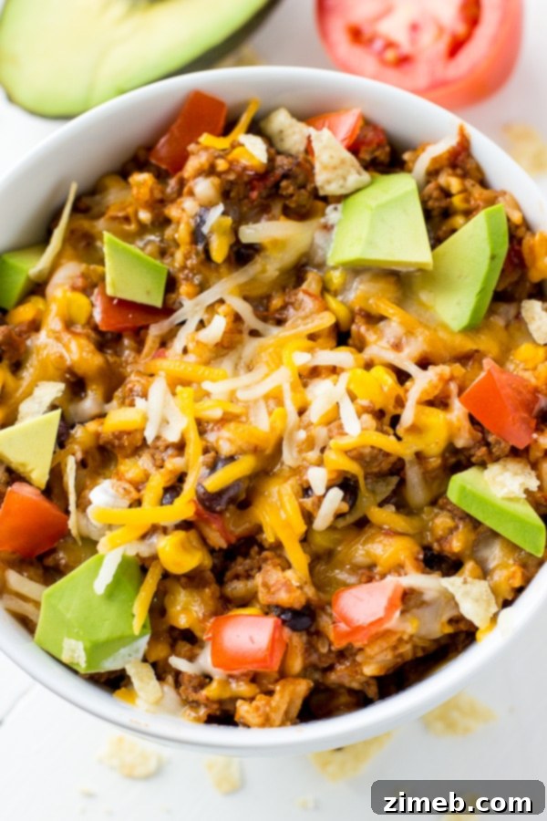 Instant Pot Burrito Bowls – Deconstructed burritos with seasoned ground beef, rice, beans, and fresh toppings, a customizable and healthy meal.