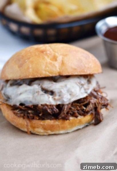 Savory Instant Pot Barbecue Beef Sandwiches – Pulled barbecue beef, slow-cooked to perfection in the Instant Pot, ideal for sandwiches.