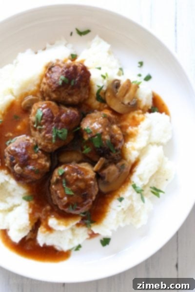 Salisbury Steak Meatballs – Instant Pot – Classic Salisbury steak flavors transformed into convenient meatballs, simmered in a savory mushroom gravy.