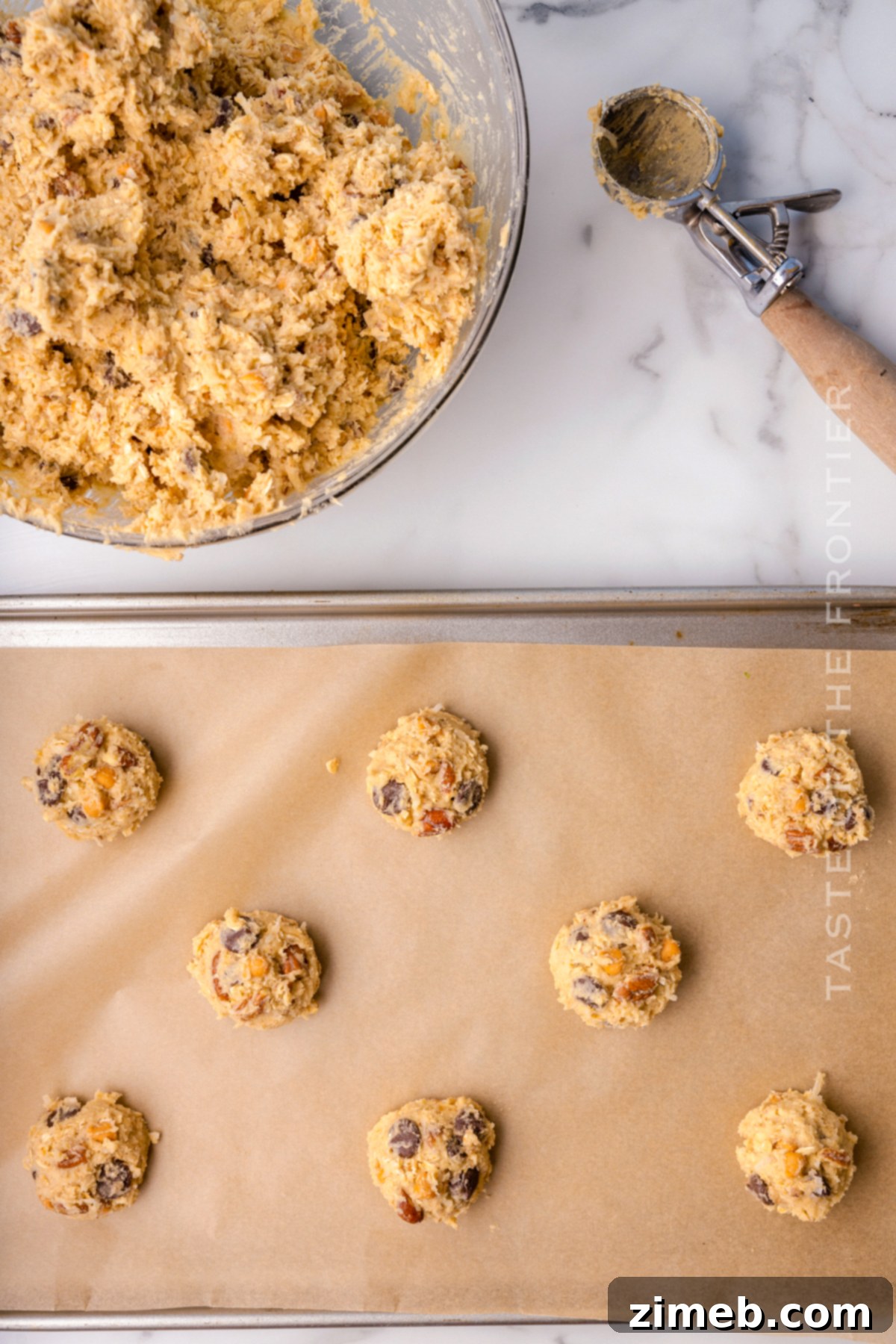 Scooping cookie dough for Cowboy Cookies