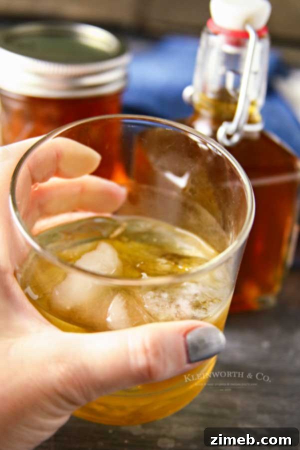 Crock-Pot Salted Caramel Moonshine 8 Spirits - Slow Cooker Salted Caramel Moonshine in a glass with ice