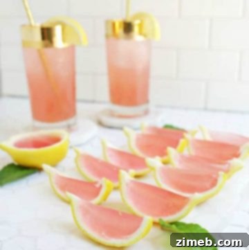Pink Lemonade Jello Shots with lemon slice garnish