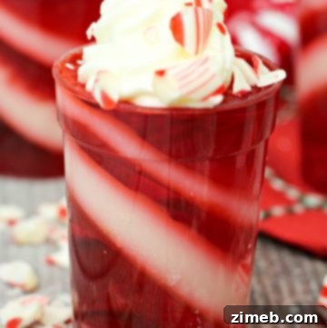 Candy Cane Jello Shots with peppermint garnish