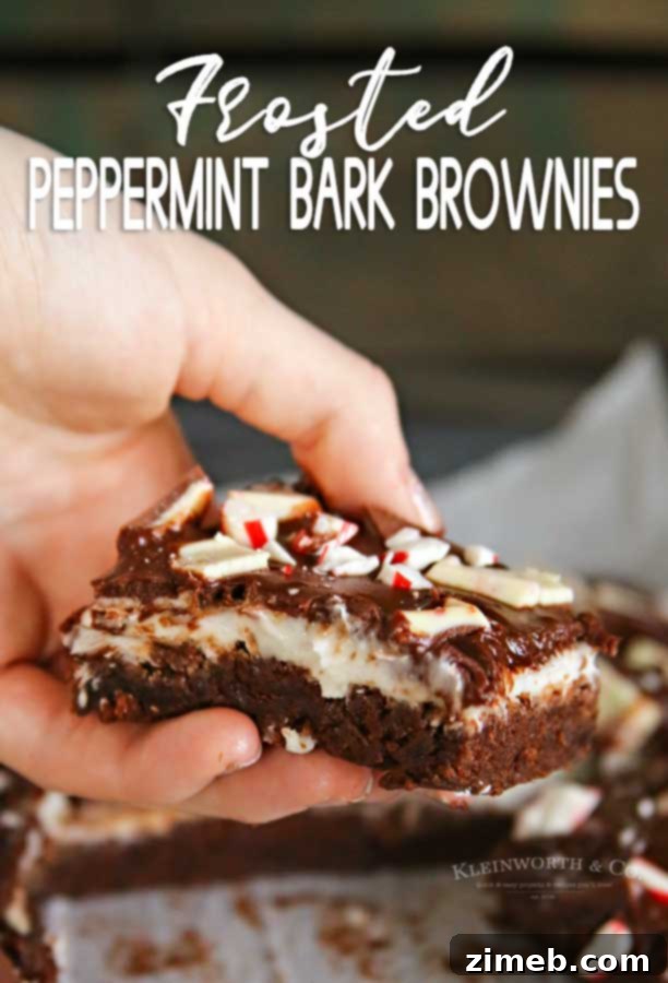 Snow-Kissed Peppermint Bark Brownies 21 Frosted Peppermint Bark Brownies ready to serve