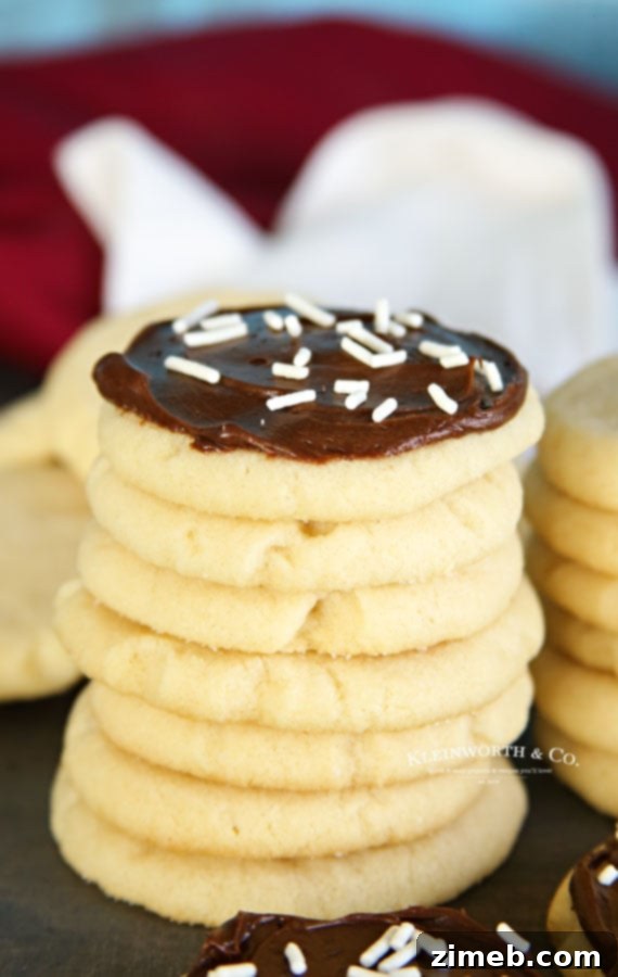 Perfect Sugar Cookies with Just 4 Ingredients 9 stack of sugar cookies with chocolate frosting, made with only 4 ingredients