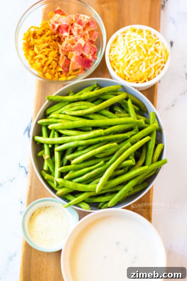 Ultimate Green Bean Bake 4 Ingredients laid out for making Loaded Green Bean Casserole, including green beans, bacon, cheese, and soup.