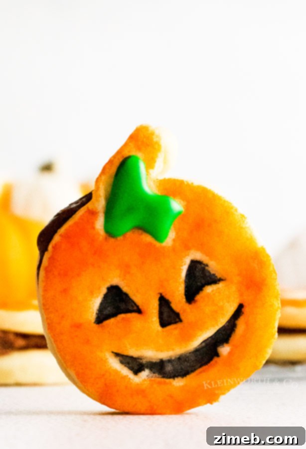 Pumpkin Shortbread Cookies with Chocolate filling for Halloween