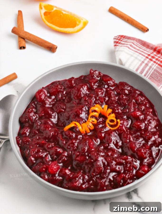 Effortless Cranberry Sauce 3 Close-up of freshly made Homemade Cranberry Sauce in a beautiful serving bowl, ready for the holiday table.