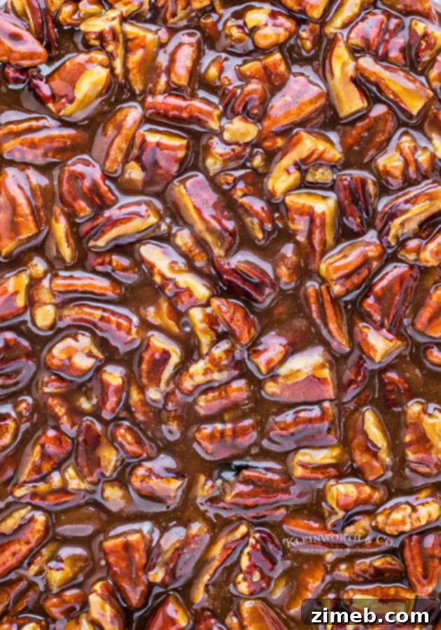 Ultimate No-Bake Pecan Pie Cheesecake 5 sticky pecan caramel topping