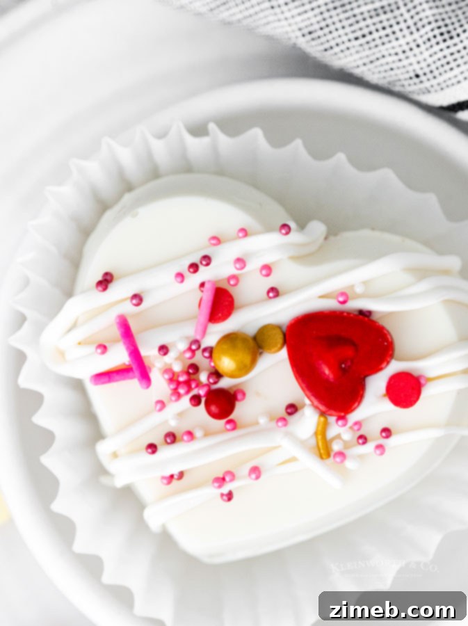 Mug-Melting Cocoa Surprises 13 Cute Valentine Hot Chocolate Bombs with pink and red sprinkles