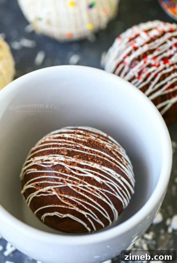 Mug-Melting Cocoa Surprises 23 Hot Chocolate Bombs melting in a mug, revealing marshmallows