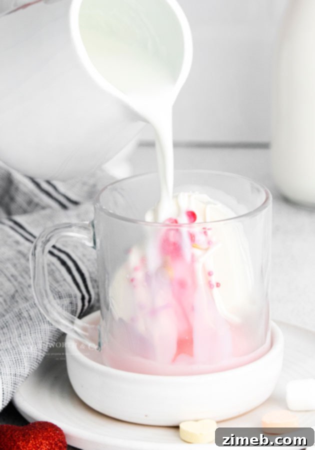 Mug-Melting Cocoa Surprises 25 Making Valentine Hot Chocolate Bombs by sealing halves together