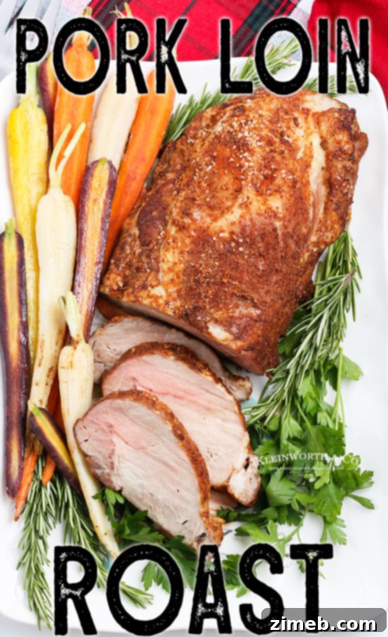 Succulent Pork Loin 18 A whole roasted Pork Loin Roast on a serving platter, garnished and ready for a meal.