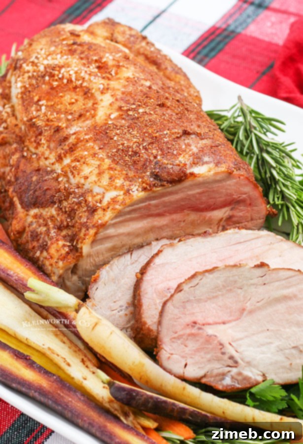 Succulent Pork Loin 9 Succulent roasted pork loin, golden brown and perfectly cooked, showcasing a beautiful texture.