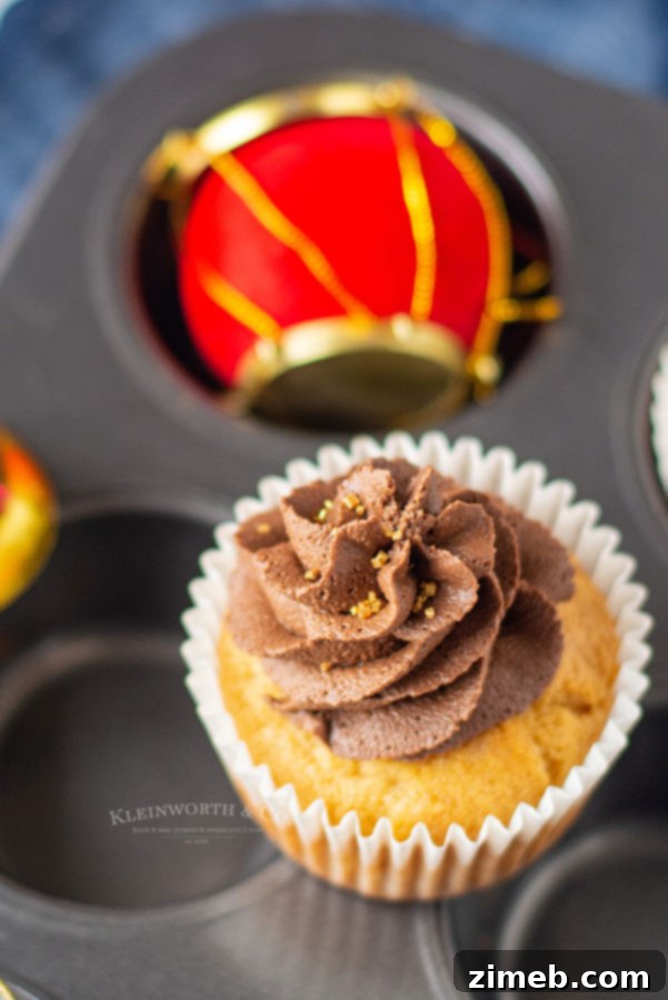 Christmas themed Nutella Filled Cupcakes with chocolate frosting.