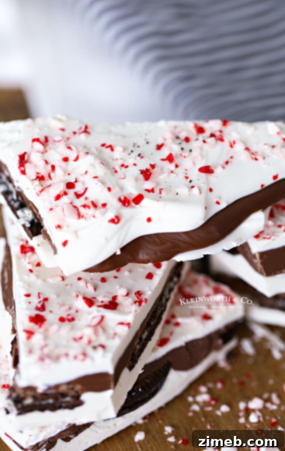 Stack of Oreo Peppermint Bark pieces, showcasing layers