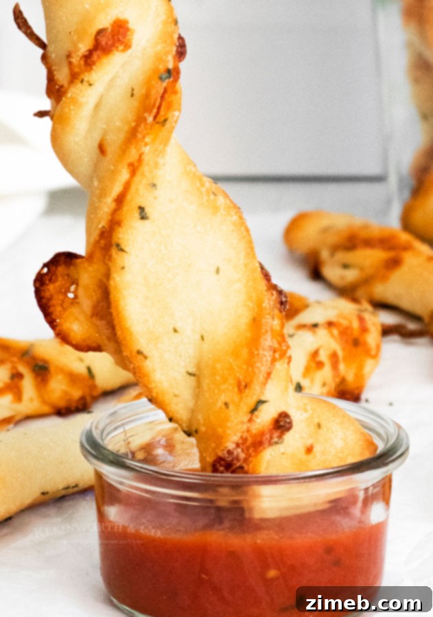 Pepperoni Pizza Bites 12 Plate of Pepperoni Pizza Dippers served with a bowl of marinara sauce for dipping
