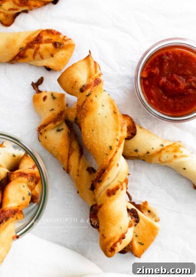 Pepperoni Pizza Bites 3 Variety of Pepperoni Pizza Dippers arranged artfully, perfect for a game day snack or party appetizer