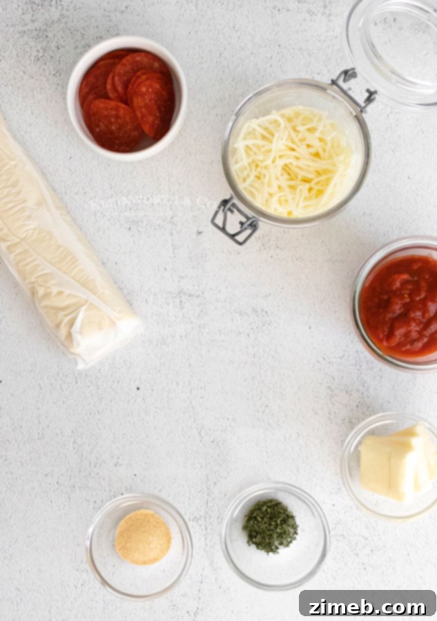Pepperoni Pizza Bites 6 Overhead shot of all the simple ingredients required to make Pepperoni Pizza Dippers