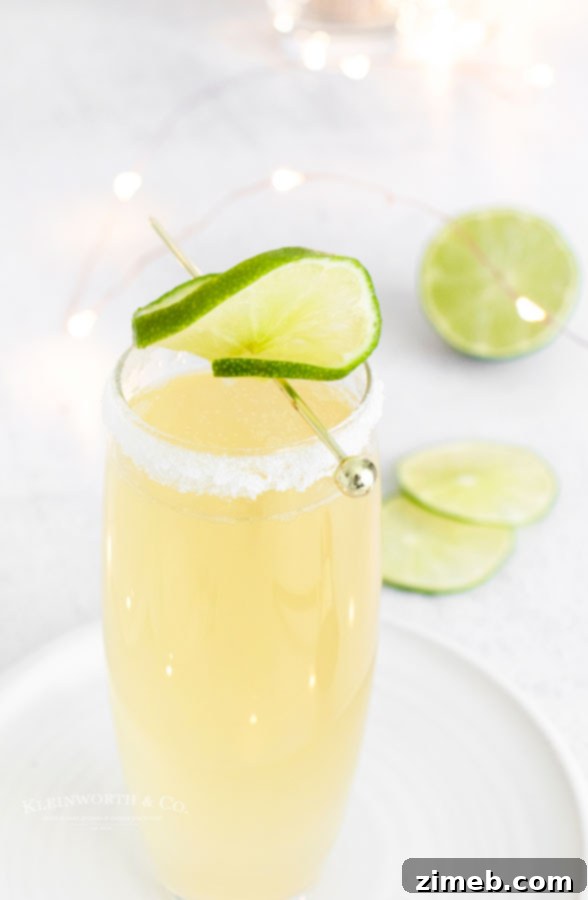 Bubbly Champagne Margarita 5 New Year's drink - Sparkling Margarita garnished with lime