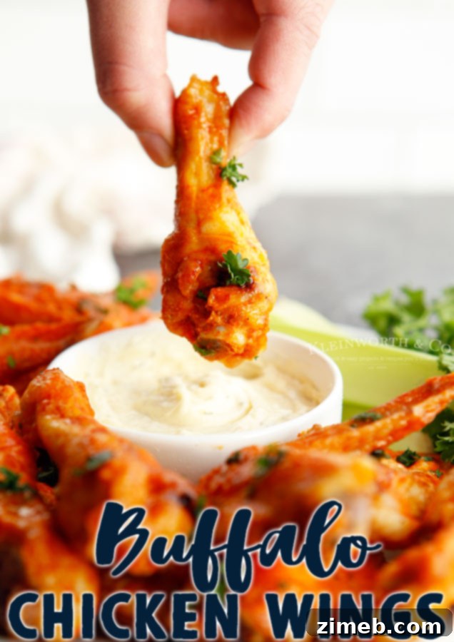 Ultimate Buffalo Wings 18 A plate of freshly prepared Buffalo Chicken Wings with dipping sauce.