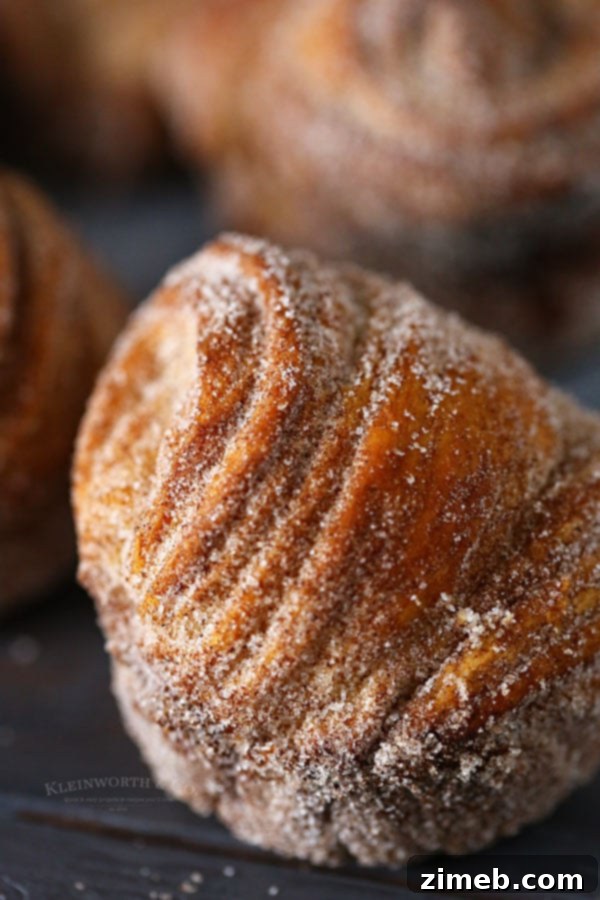 Effortless Homemade Cruffins 4 Canned dough cruffins with a denser, doughy texture.