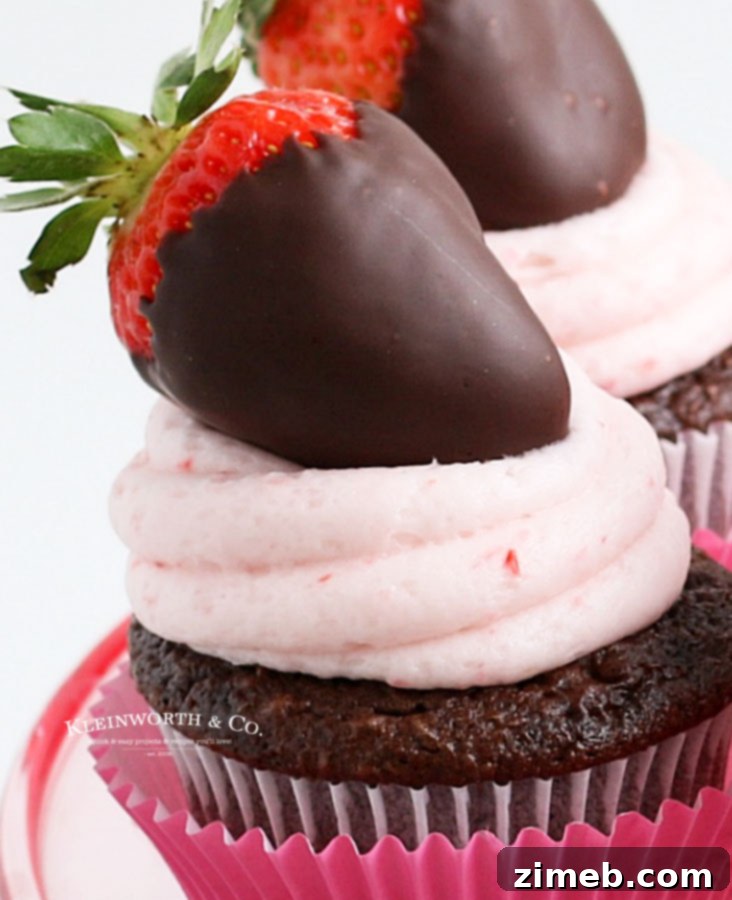 Decadent Chocolate Strawberry Cupcakes 11 Chocolate cupcake with strawberry frosting and fresh strawberries