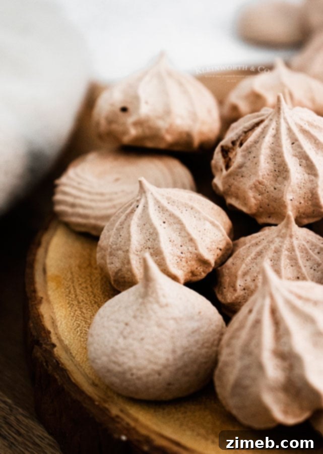 Crisp Chocolate Meringue Clouds 3 Pile of Dark Chocolate Meringue Cookies ready to be eaten