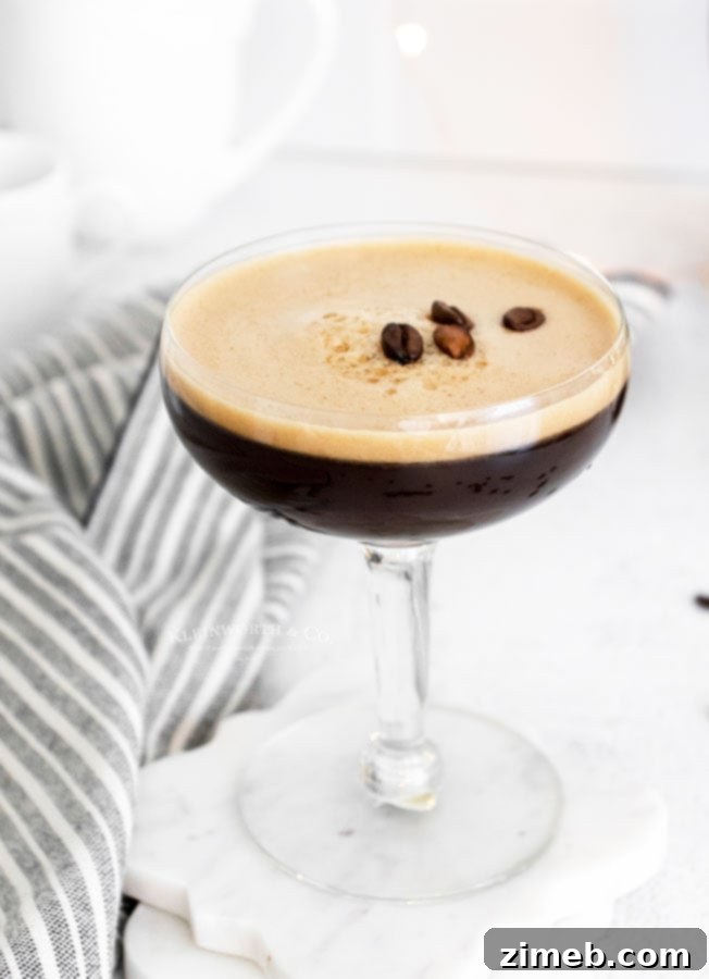 Classic Coffee Martini with a velvety foam, made with vodka and coffee liqueur.