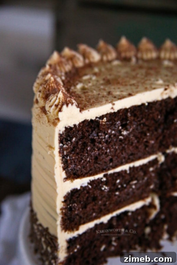 Rich Coffee Buttercream Frosting 6 Decadent coffee frosting artfully spread on a chocolate cake, highlighting its rich color and inviting texture.