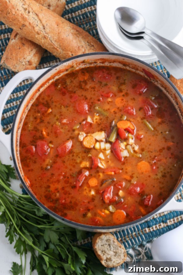 Hearty Homestyle Chicken & Vegetable Soup 4 Hearty slow cooker chicken vegetable soup simmering to perfection.
