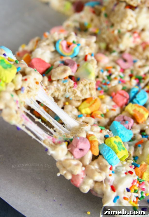 Charmed Confections 9 A plate of homemade Lucky Charms Rice Crispy Treats, showcasing the colorful marshmallows.
