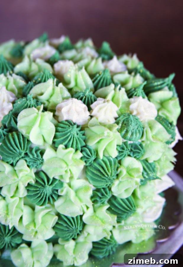 Mint Chocolate Chip Cake 6 Mint chocolate cake with green buttercream frosting and festive decorations