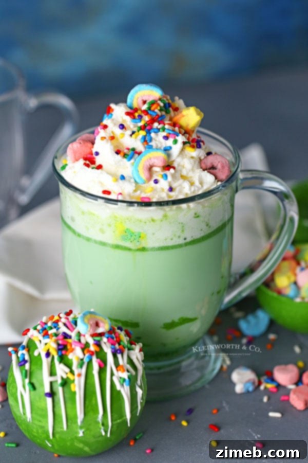St. Patrick's Day Hot Cocoa Bombs with rainbow marshmallows