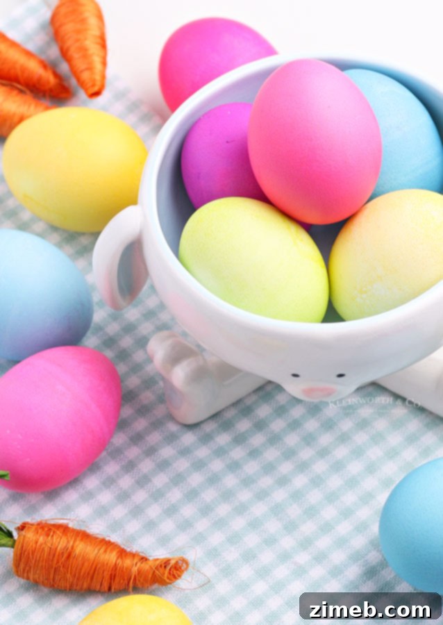 The Art of Vibrant Egg Dyeing 3 Vibrant, colorful Easter eggs drying on a rack