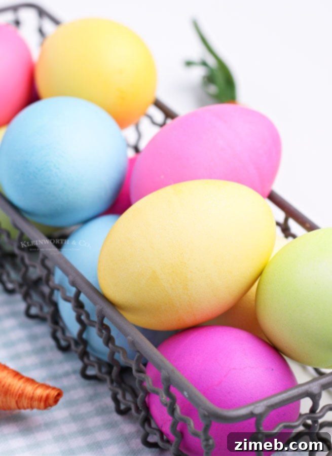 The Art of Vibrant Egg Dyeing 4 A person carefully dipping an egg into food coloring solution