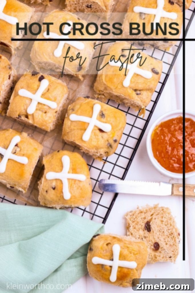 Hot Cross Buns - a traditional spiced sweet bun recipe made with fruit and marked with a cross on top, typically served for Good Friday.