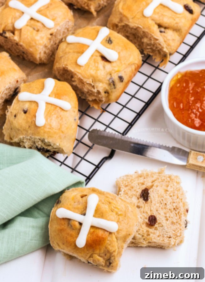 A batch of old fashioned Hot Cross Buns, perfectly golden and spiced, a timeless treat for Good Friday.