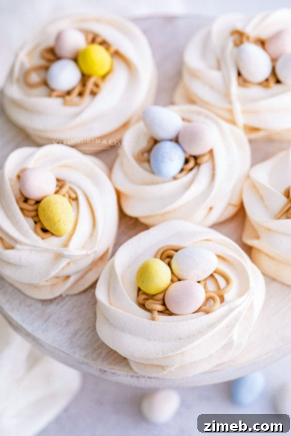 Delicious treats Easter Egg Meringue Nests on a white plate