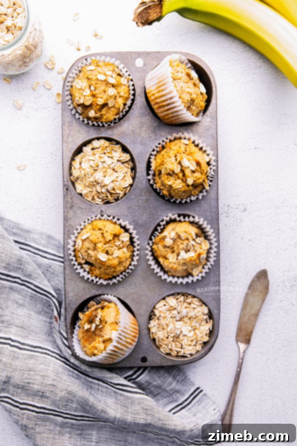 Wholesome Banana Carrot Muffins 4 Homemade banana carrot muffins, perfect for a healthy breakfast.