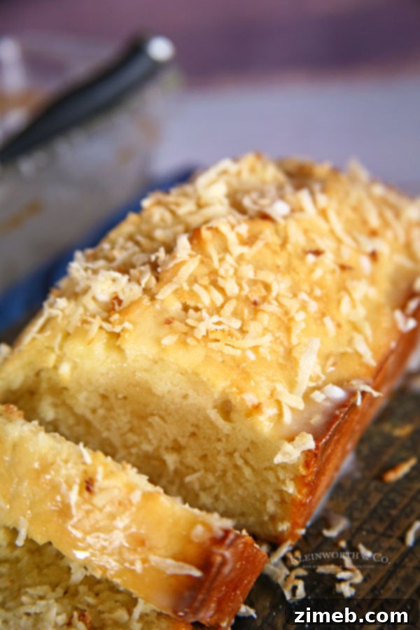 Tropical Coconut Loaf 9 glazed coconut bread in loaf pan