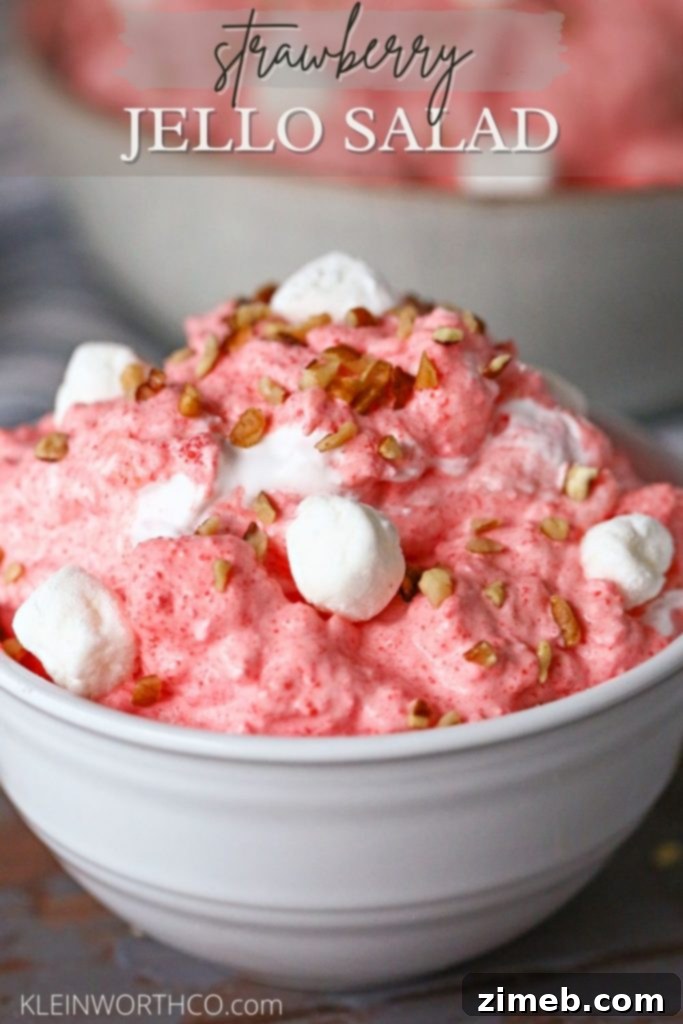 Strawberry Jello Salad, a vibrant and creamy side dish perfect for family gatherings.